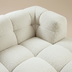 Close-up of the tufted bubbles and looped bouclé at the corner, in Cloud White