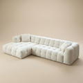 Cloud Corner Sectional in Cloud White bouclé, chaise left, three-quarter view