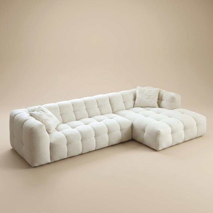 Cloud Corner Sectional in Cloud White bouclé, chaise right, three-quarter view