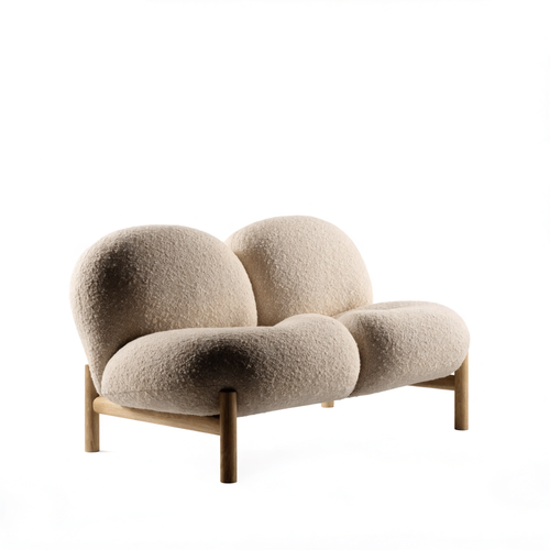 The Nest two-seater loveseat in oatmeal bouclé