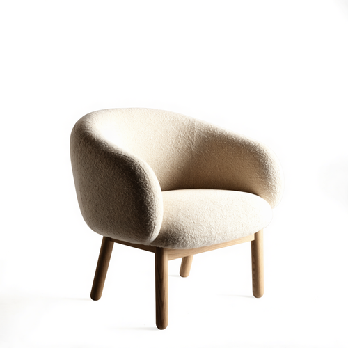 The Lull low lounge chair in oatmeal bouclé