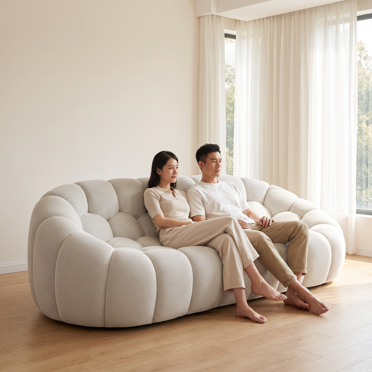 Couple filling the AP-89 2 seat sofa in Cloud White