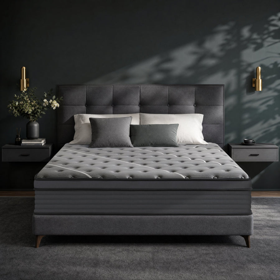 Rest Hybrid Mattress on a gray upholstered bed