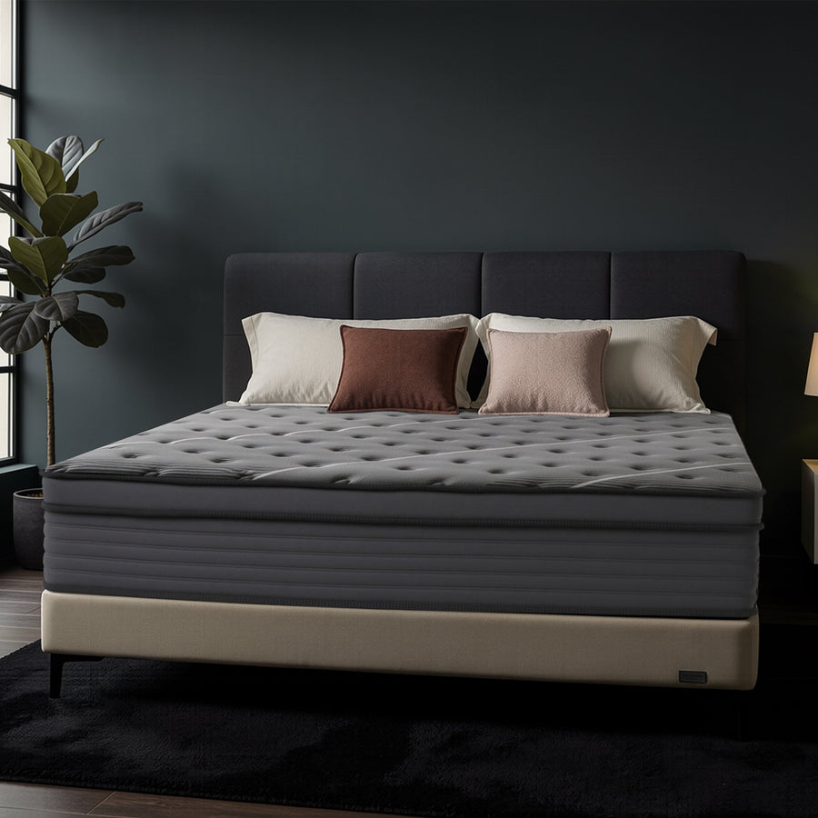 Rest Hybrid Mattress with quilted pillow top in a bedroom